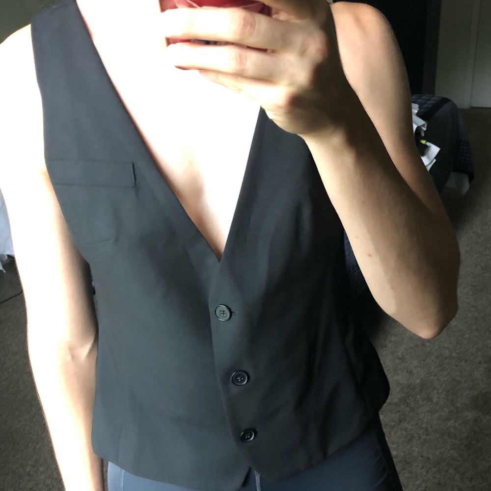 Black button up vest